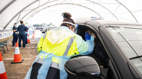 Kent Allen having a COVID test at the St Vincent’s at Bondi Beach drive through COVID-19 testing Clinic, his girlfriend is a teacher at Bondi Beach Public School. During  Sydney’s lockdown, Bondi Beach.  COVID-19 Coronavirus. 10th August 2021 Photo Louise Kennerley SMH