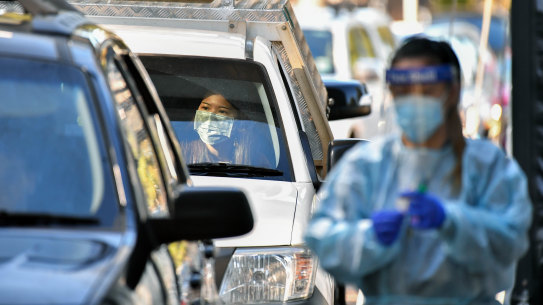 People queue for COVID-19 testing.