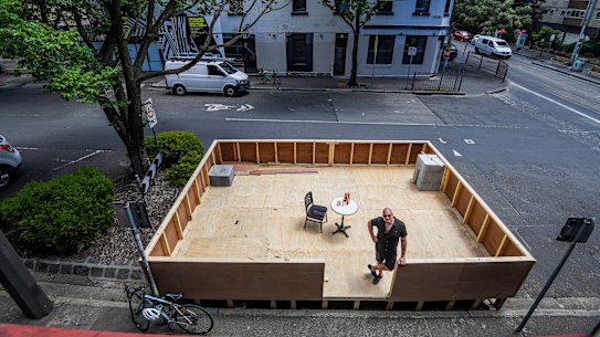 The parklet outside The Everleigh cocktail bar is under construction.