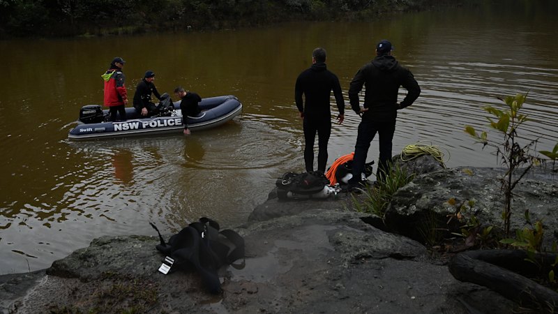 Father, son missing after car plunges into river as rain lashes Sydney