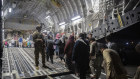Afghan passengers board a US Air Force C-17 Globemaster III during the evacuation at Hamid Karzai International Airport, Kabul.