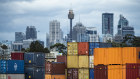 Shipping containers sit idly in Sydney.