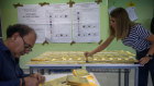 Officials prepare ballots papers in Rome as polling stations opened in Italy’s general election. 
