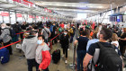 Sydney Airport will deploy an extra 60 customer service staff to manage queues and bring passengers in order of flight priority to deal with the peak.