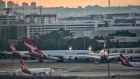 A Qantas flight from Sydney to Adelaide was turned around in mid-air on Tuesday afternoon after a coronavirus hotspot emerged at Adelaide Airport.