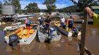 Scenes of flood devastation at St George’s Caravan park at Lower Portland in NSW.