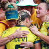 Teagan and Maddison Levi are comforted following the women’s sevens side’s loss in the bronze-medal match.