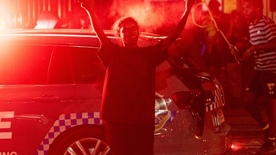 Community members protest outside Alice Springs Hospital.