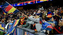 ADELAIDE, AUSTRALIA - MAY 02:   Crows fans  celebrates a goal during the round eight AFL match between Adelaide Crows and Port Adelaide Power at Adelaide Oval, on May 02, 2024, in Adelaide, Australia. (Photo by Mark Brake/Getty Images)