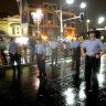 Uniformed police march in the Mardi Gras parade in 2004.