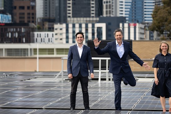 Mooney Valley council candidate Pierce Tyson, Lord Mayor candidate Nick Reece and Port Phillip council candidate Heather Consulo at the solar array on top of Wilson Hall at the University of Melbourne.