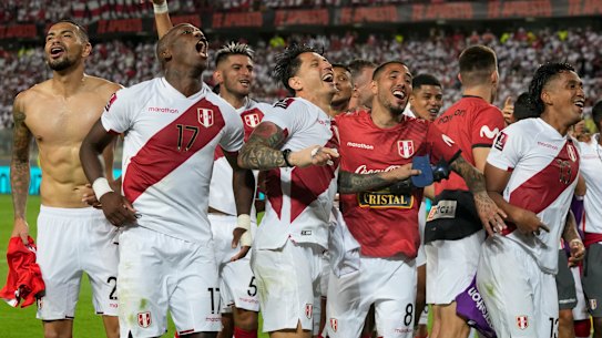 Peru celebrate after booking a spot in the play-off with a 2-0 win over Paraguay in March.