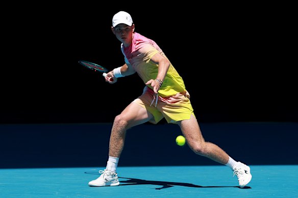 Henry Bernet, of Switzerland, plays a forehand against Benjamin Willwerth, of the United States, in their junior boys’ singles final.
