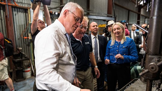 Prime Minister Scott Morrison on the campaign trail yesterday. 