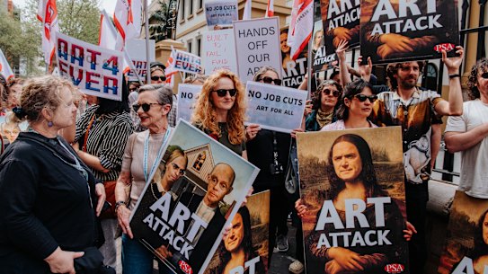 Protesters gather outside Parliament House.