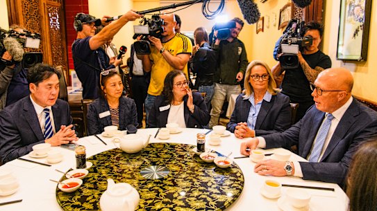 Peter Dutton attempted to woo Chinese Australian voters, such as at this campaign stop at the Imperial Chinese Restaurant in Melbourne, but they swung against him in some key booths.