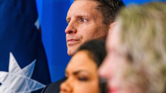 Andrew Hastie stands with Jacinta Nampijinpa Price, who was sidelined for her views on immigration.