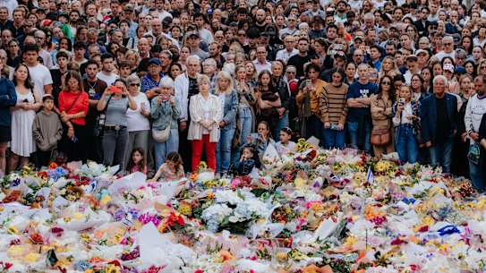 Vigil at the Bondi Pavilion Memorial near the site of the terrorist attack on Bondi Beach on Sunday. . Tuesday, December 16, 2025. Photo: James Brickwood. SMH NEWS 251216. The rabbi's sister wears a headscarf