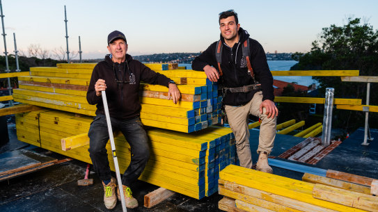Gary Bradshaw, foreman with One Up Building, and carpenter Liam Petsas.