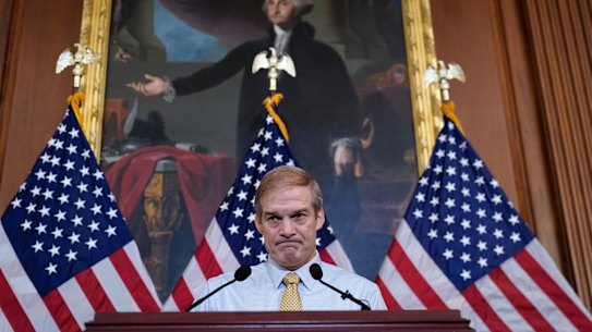 Jim Jordan, staunch ally of Donald Trump, meets with reporters about his struggle to become speaker of the House, at the Capitol in Washington.
