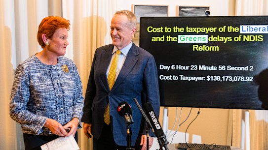 An unusual pairing … Pauline Hanson with Bill Shorten in his ministerial office.