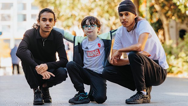 Taking a stand: Russell Edwards, 15, and Kayne Jarrett, 18, with their cousin Stanley Correy, 8.