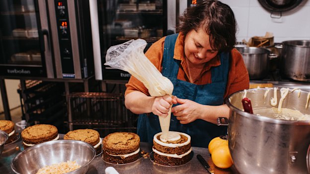 Nadine Ingram prepares carrot cakes with honey cream cheese icing. “I am extremely resilient and persevering,” she says of building Flour and Stone. “… But oh, it was a flogging at the start.”