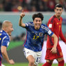 World Cup LIVE: Famous Japanese victory sends Germany packing, Spain advance