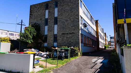 The unit block in Belmore where a man, aged in his 30s, was found stabbed to death. His friend was released without charge.