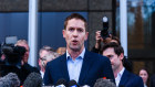 Nine’s managing director of publishing, James Chessell, speaks to media outside a Sydney Federal Court. 