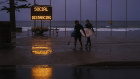 A rainy day, in more ways than one: people were few and far between at Sydney's Manly on the last weekend in March.