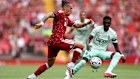 Liverpool’s Konstantinos Tsimikas battles with Monaco’s Lamine Camara during a pre-season friendly at Anfield this week.