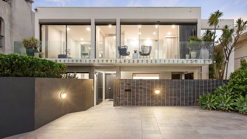 $410,000 price drop sells beachfront home in weak market