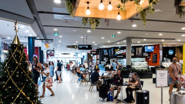 Westfield Warringah Mall on Christmas Eve, is much busier than it was earlier in the week.