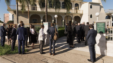 Members of the legal profession and Muslim community arrive at Auburn Gallipoli Mosque.