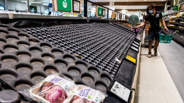 Empty fresh produce shelves at Woolworths in Sydney’s Neutral Bay on Friday.