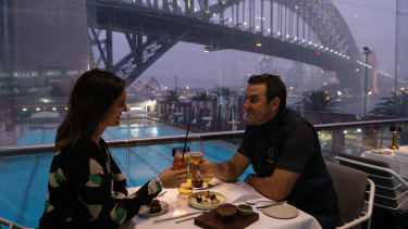 Chris and Marta Yates celebrate their wedding anniversary at Aqua Dining as restaurants reopen after restrictions eased in NSW. 