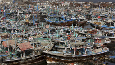 Fishing boats are anchored ahead of the expected cyclone in Karachi, Pakistan.