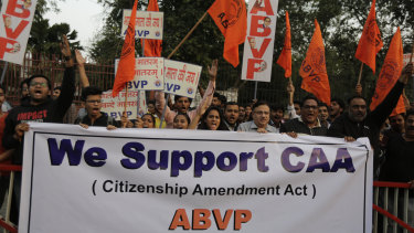 Supporters of ABVP, a right-wing student organisation affiliated with the Hindu nationalist RSS march in support of the new citizenship law in Ahmadabad.