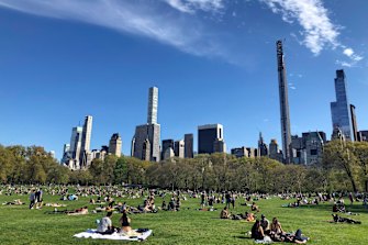 New York City police dispatched 1000 officers at the weekend to enforce social distancing as warmer weather tempted New Yorkers to come out of quarantine. 