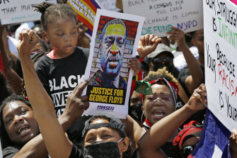 Andrew Romanoff A Black Lives Matter rally in Brooklyn at the weekend. Race and class are inexorably linked in the US.