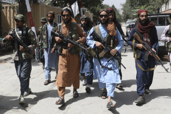 Trying to look cool: Taliban fighters in the Wazir Akbar Khan neighbourhood of Kabul.