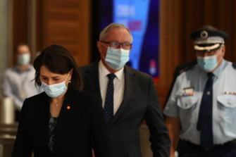 NSW Premier Gladys Berejiklian, Health Minister Brad Hazzard and NSW Police Deputy Commissioner Gary Worboys on Tuesday.