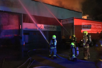 Firefighters battling the blaze at Admiral International’s warehouse in 2018.