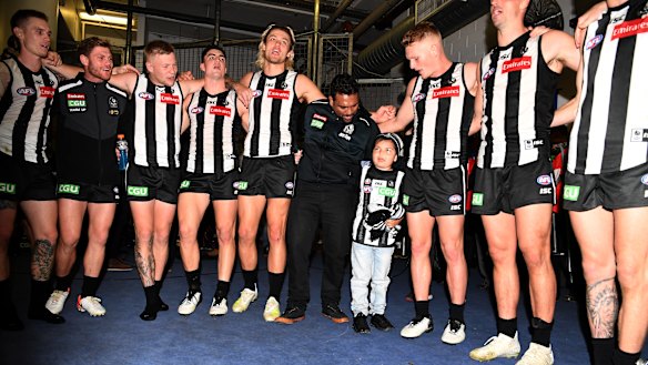 Well played: Collingwood gave young cancer sufferer Kyron McGuire the night of his life in their win over Port Adelaide.