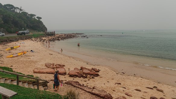 Merimbula's Bar Beach is usually crowded with tourists in January.