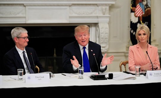 Tim "Apple" and the Trumps during their White House meeting on Wednesday.