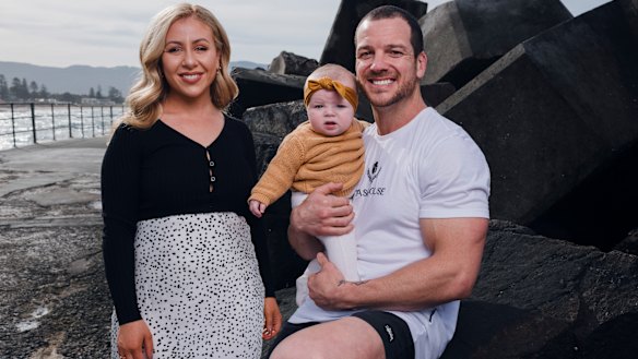 Mullen with partner Tam Chessell and six-month-old daughter Stevie.