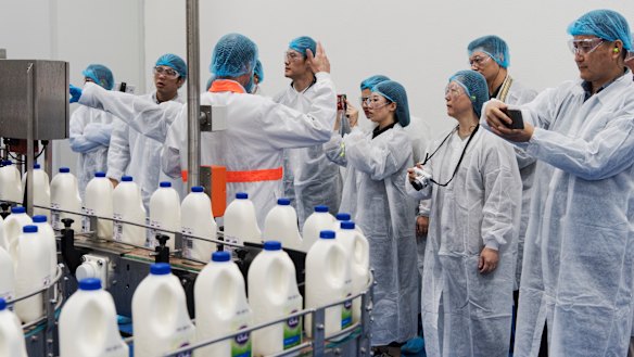 Officials and members of Chinese state owned media companies visit the A2 Milk factory in Sydney. 