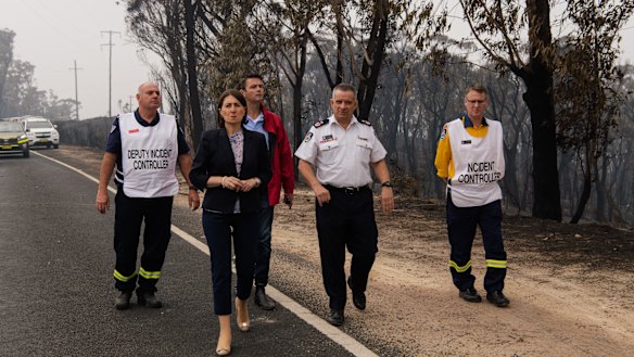 NSW Premier Gladys Berejiklian and RFS Deputy Commissioner Rob Rogers visit The Darling Causeway, Mt Victoria on Monday.
